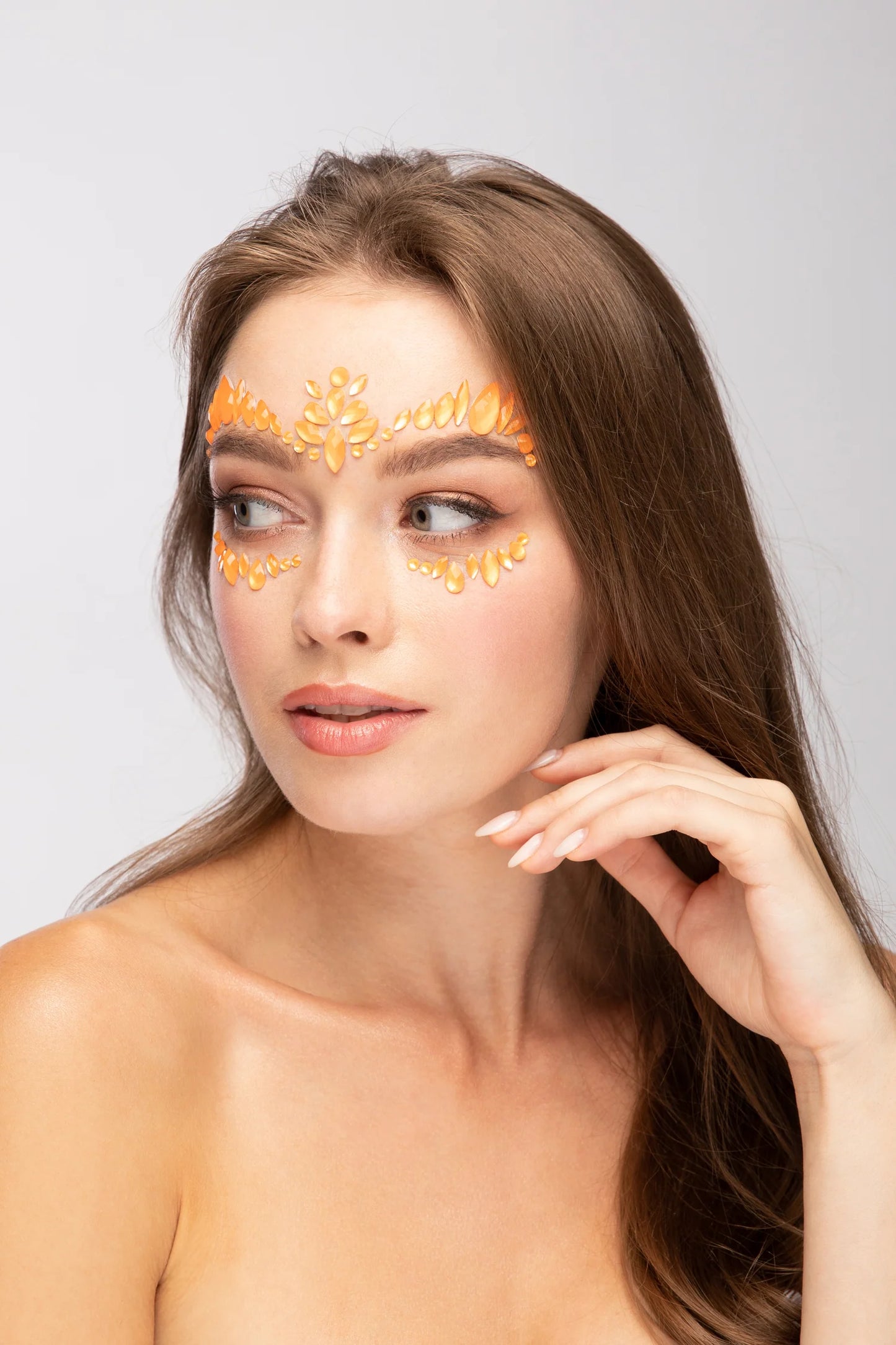 orange uv neon face jewels, orange neon face gems