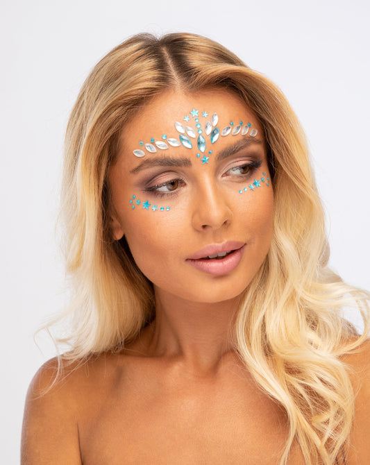 Face jewels and face gems on face, under the sea