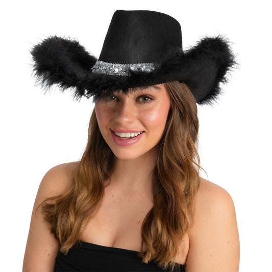 Woman wearing a black cowboy hat with fur marabou and sequins on a white background good for both cowgirls and cowboys
