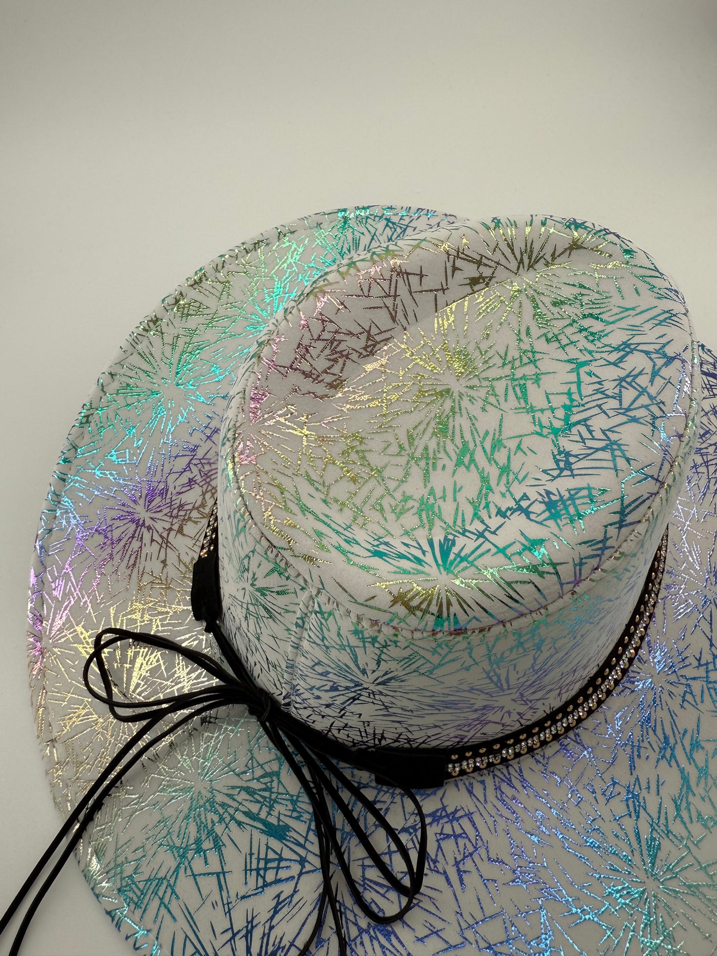 top view image of Decorative cowboy hat with a patterned design on a white background